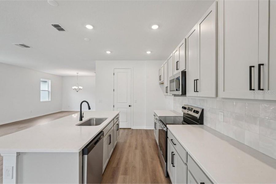 Furnished interior view inside a new home in Sunbrooke, St. Cloud (Image 4). Furnished interior view inside a new home in Sunbrooke, St. Cloud (Image 4).
