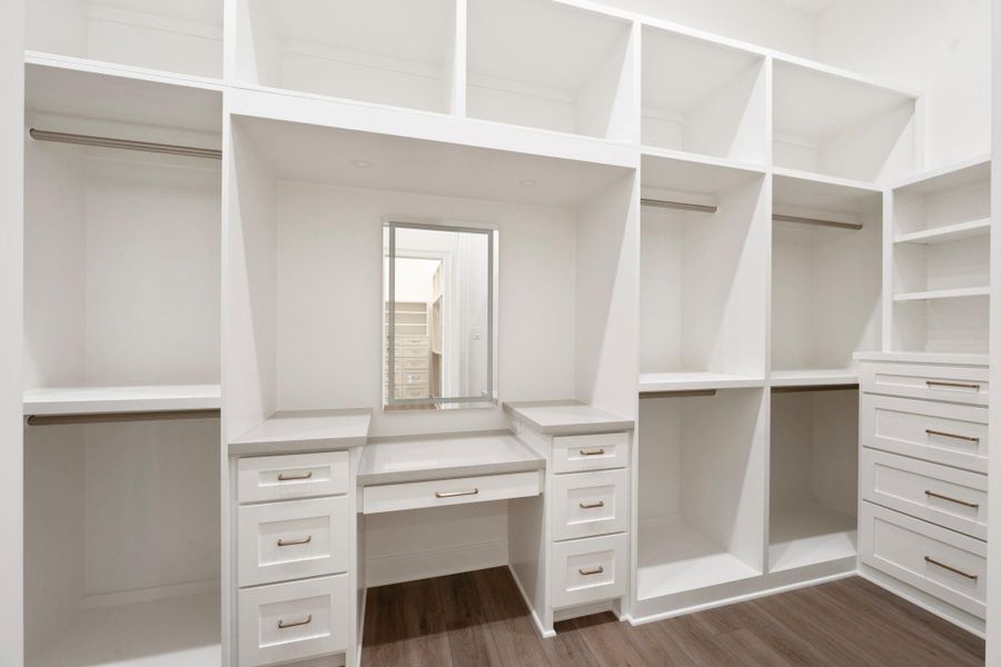 Second her master closet with vanity area.