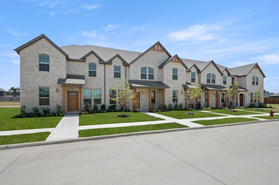 Front exterior of a new home in Sanger Circle – Townhomes, Sanger, TX, highlighting curb appeal (Image 2). Front exterior of a new home in Sanger Circle – Townhomes, Sanger, TX, highlighting curb appeal (Image 2).