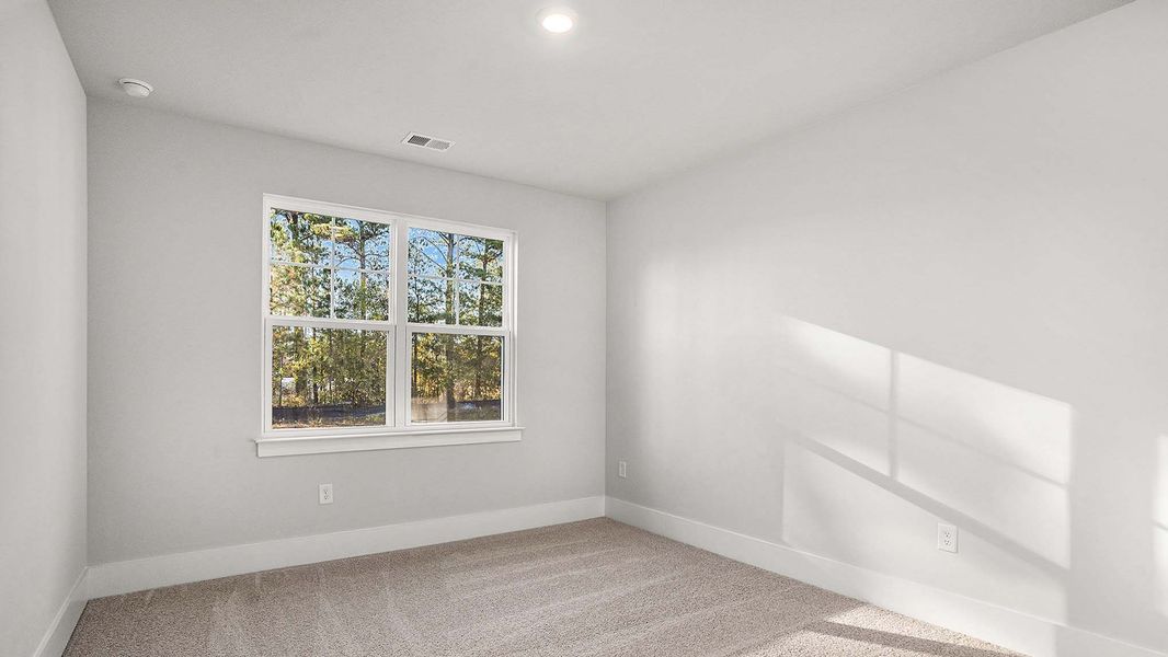 Spacious, unfurnished interior of a new home in Coastal Farms, Conway (Image 11). Spacious, unfurnished interior of a new home in Coastal Farms, Conway (Image 11).