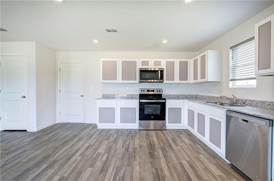 Furnished interior view inside a new home in Kingston Park, Kingston (Image 5).