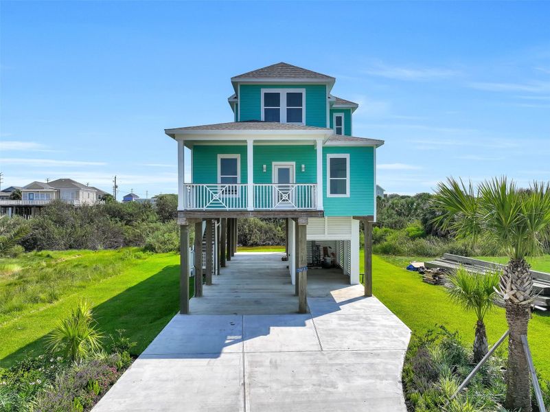 Front exterior of a new home in , Galveston, TX, highlighting curb appeal (Image 2).