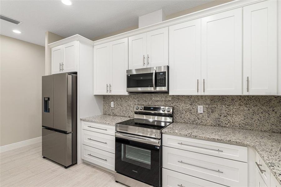 Furnished interior view inside a new home in , Summerfield (Image 8). Furnished interior view inside a new home in , Summerfield (Image 8).