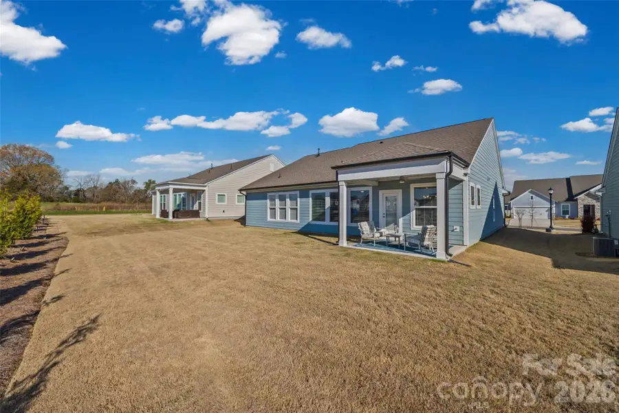 Exterior details and patio area of a home in Encore at Harmony, Harrisburg (Image 3). Exterior details and patio area of a home in Encore at Harmony, Harrisburg (Image 3).