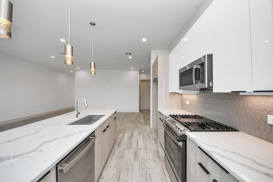 Furnished interior view inside a new home in Agua, Houston (Image 9). Furnished interior view inside a new home in Agua, Houston (Image 9).