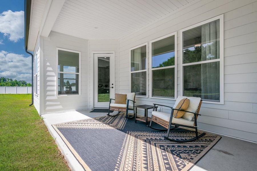Exterior details and patio area of a home in Country Club Creek, Ayden (Image 2).