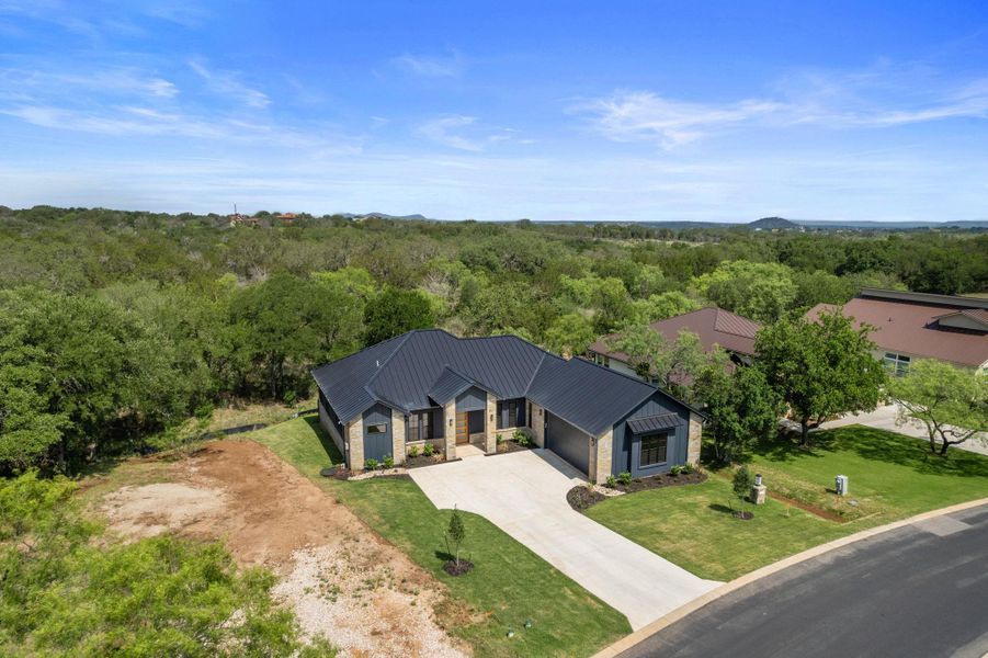 Front exterior of a new home in , Horseshoe Bay, TX, highlighting curb appeal (Image 1).