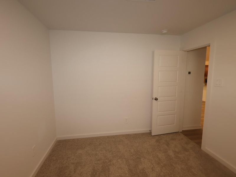 Spacious, unfurnished interior of a new home in Pinewood at Grand Texas, New Caney (Image 22).