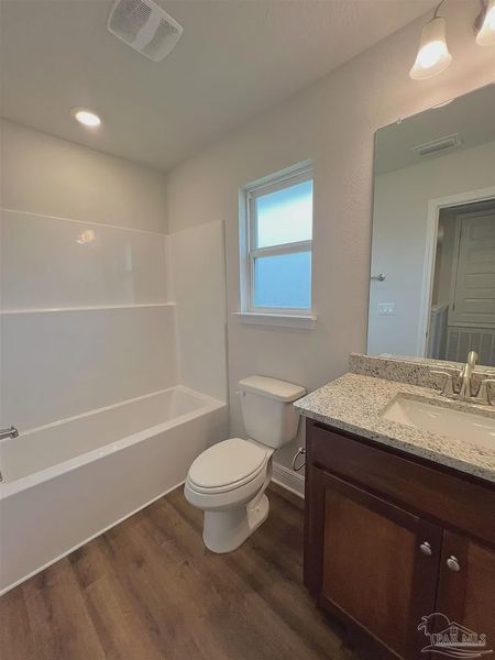 Furnished interior view inside a new home in Pine Top, Cantonment (Image 7).