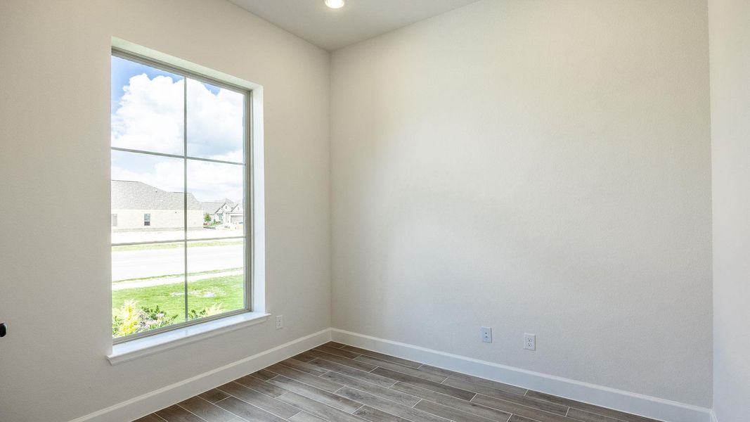 Spacious, unfurnished interior of a new home in Lariat 45', Liberty Hill (Image 11). Spacious, unfurnished interior of a new home in Lariat 45', Liberty Hill (Image 11).
