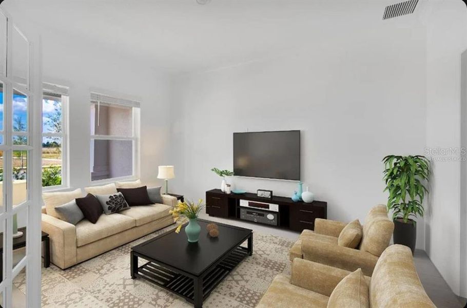Furnished interior view inside a new home in Harvest at Ovation, Winter Garden (Image 5). Furnished interior view inside a new home in Harvest at Ovation, Winter Garden (Image 5).
