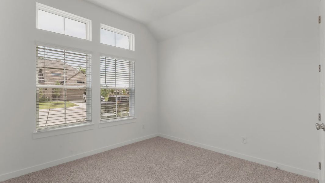 Representative unfurnished interior of a home built from the Bryson by Chesmar Homes in Newhaven, Manor (Image 11).