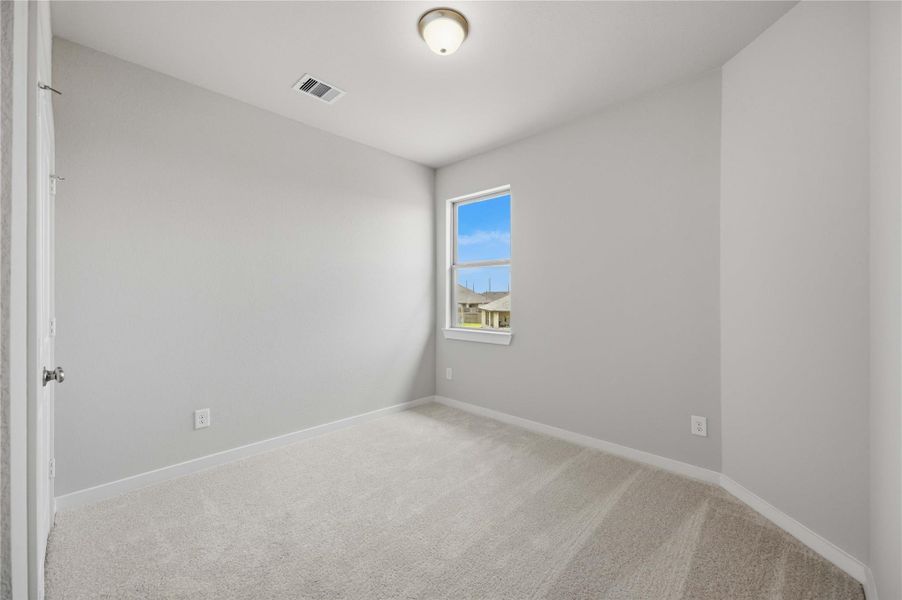 Spacious, unfurnished interior of a new home in Sunterra 40, Katy (Image 21).