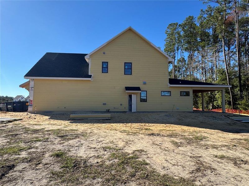 Exterior details and patio area of a home in Laureate Village, Newberry (Image 2). Exterior details and patio area of a home in Laureate Village, Newberry (Image 2).