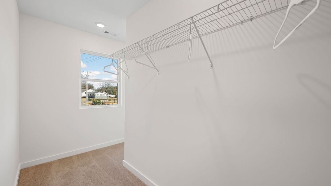 Representative unfurnished interior of a home built from the Darwin by D.R. Horton in Bayview at Harbor Crest, Ooltewah (Image 19).
