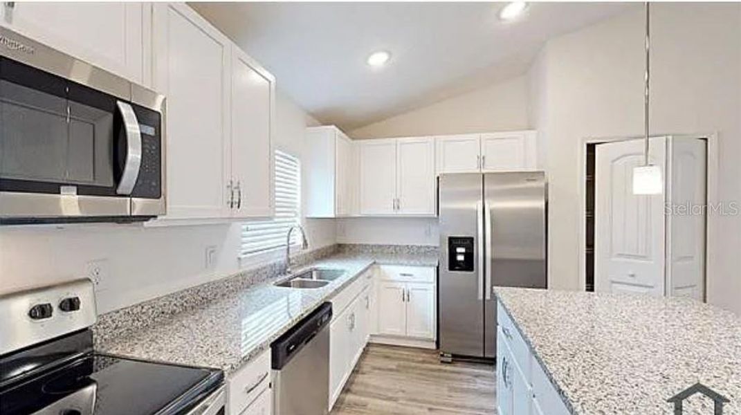 Furnished interior view inside a new home in , North Port (Image 16).