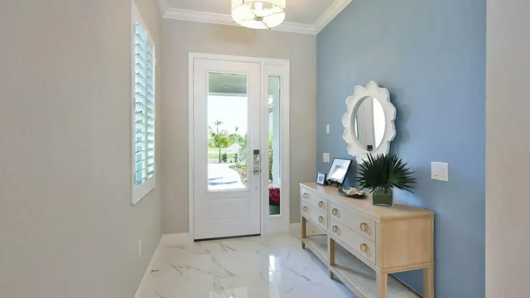 Furnished interior view inside a new home in Palm Grove Real Estate and Homes for Sale in Lakewood Ranch, FL - Neal Communities, Bradenton (Image 24).