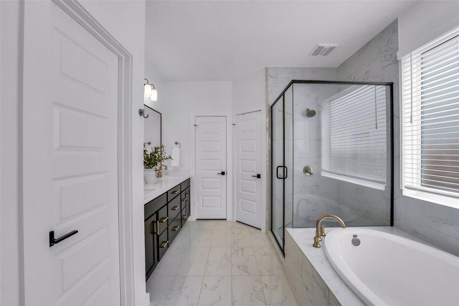 Furnished interior view inside a new home in Elyson 45' & 70', Cypress (Image 12).