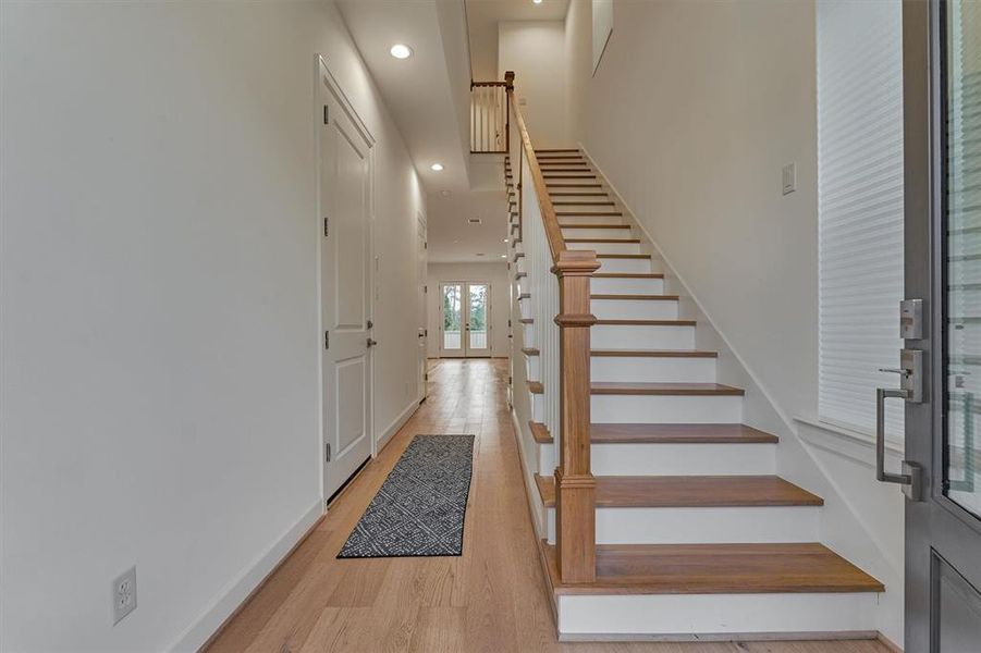 Blonde wood flooring flows throughout the entire home!