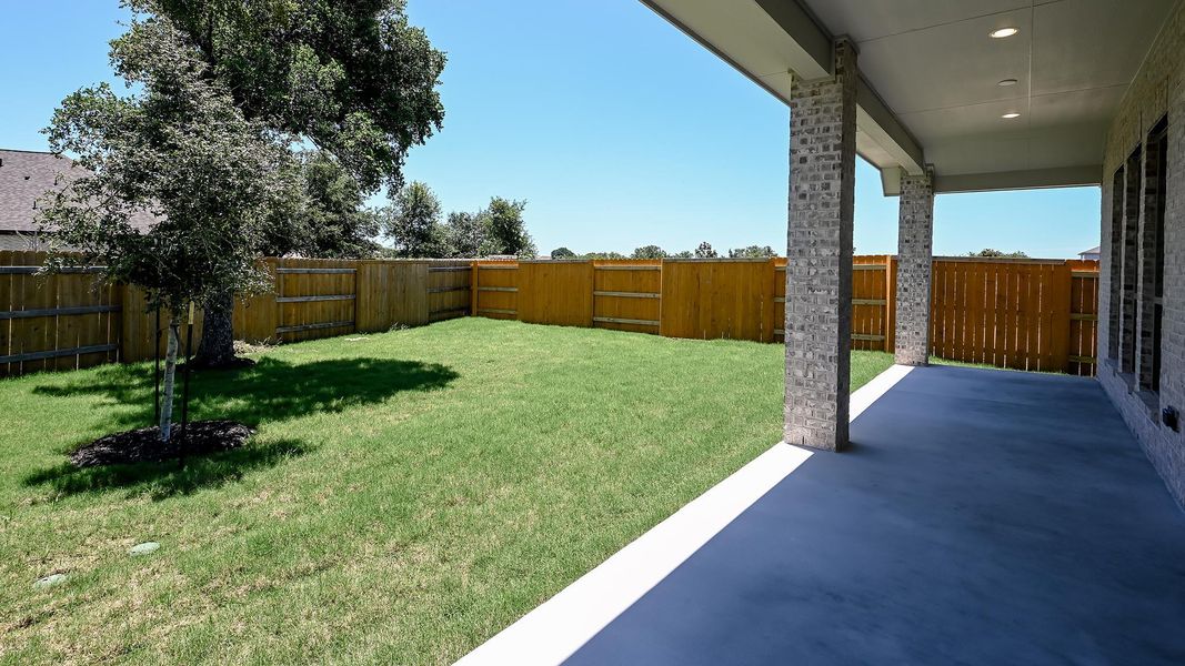 Exterior details and patio area of a home in 6 Creeks, Kyle (Image 23).