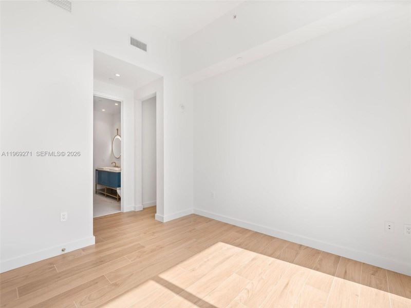 Spacious, unfurnished interior of a new home in Mr. C Residences, Miami (Image 33).