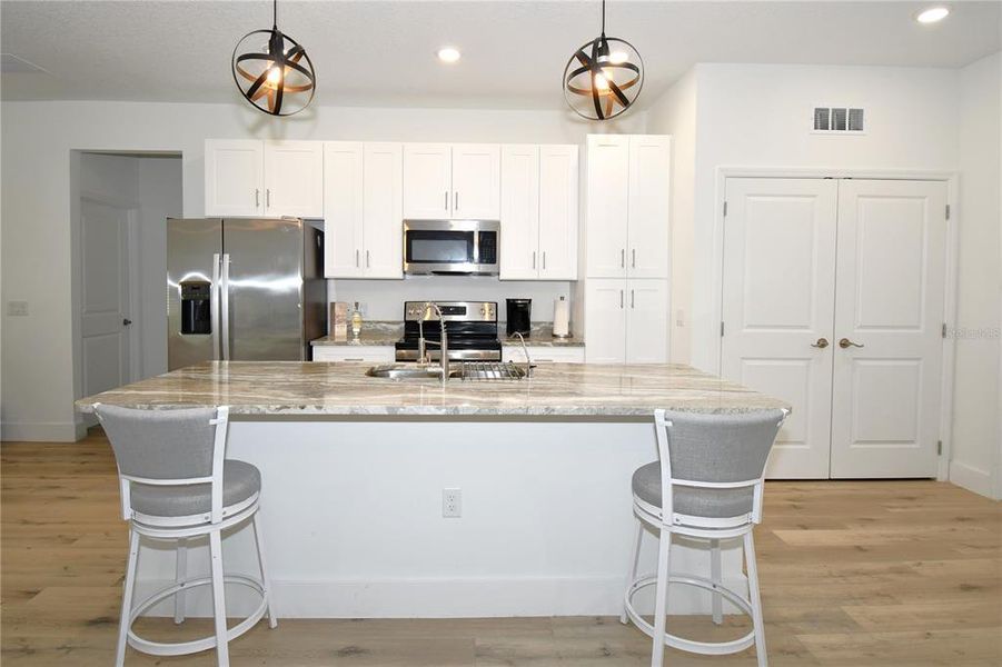 Furnished interior view inside a new home in , Poinciana (Image 12). Furnished interior view inside a new home in , Poinciana (Image 12).