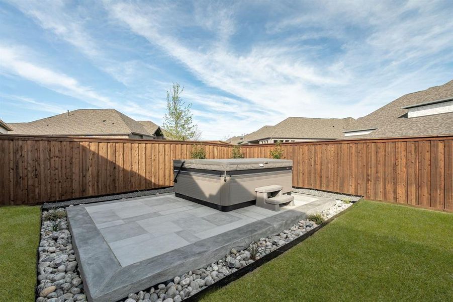 Exterior details and patio area of a home in Trinity Falls, McKinney (Image 31).