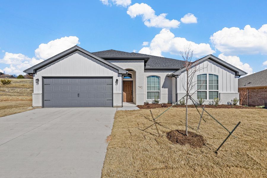Representative exterior photo of a completed home built from the Iverson I by Cheldan Homes in Pitcock Addition, Graham, TX (Image 30).