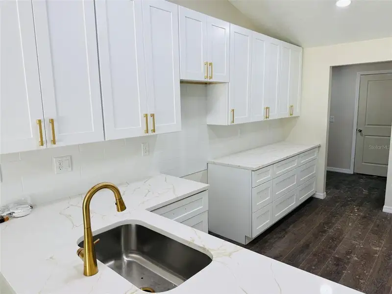 Furnished interior view inside a new home in , Weeki Wachee (Image 6).