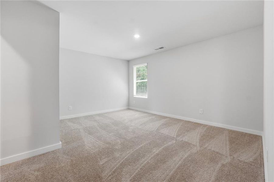 Spacious, unfurnished interior of a new home in Fern Dale, Fairburn (Image 26).