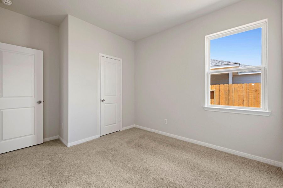 Spacious, unfurnished interior of a new home in Vacek Country Meadows, Richmond (Image 17).