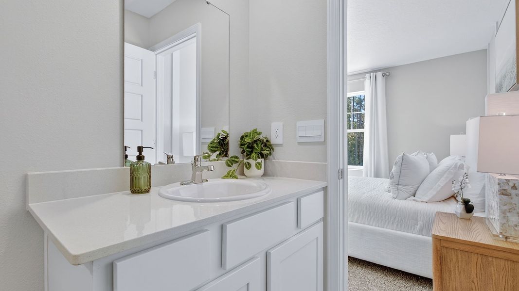 Representative furnished interior of a home built from the Baxter by D.R. Horton in Liberty Cove, Yulee (Image 17).