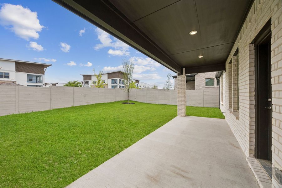 Exterior details and patio area of a home in Painted Tree Woodland West, McKinney (Image 3). Exterior details and patio area of a home in Painted Tree Woodland West, McKinney (Image 3).