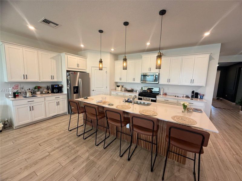 Furnished interior view inside a new home in Tradition, Port St. Lucie (Image 49).