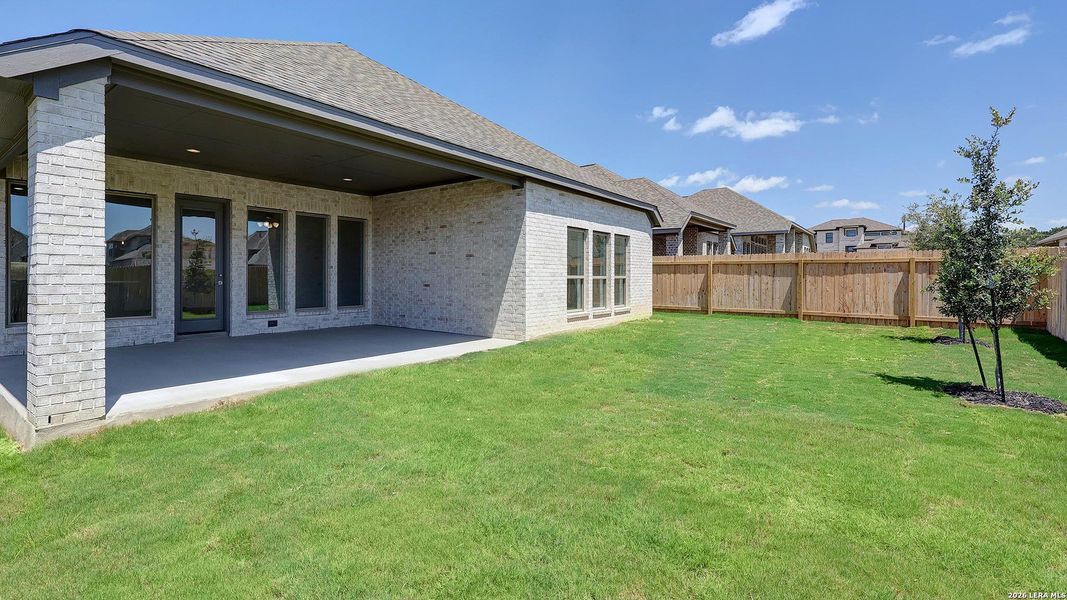 Exterior details and patio area of a home in Kallison Ranch, San Antonio (Image 26).