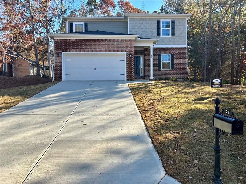 Front exterior of a new home in , Rome, GA, highlighting curb appeal (Image 2).
