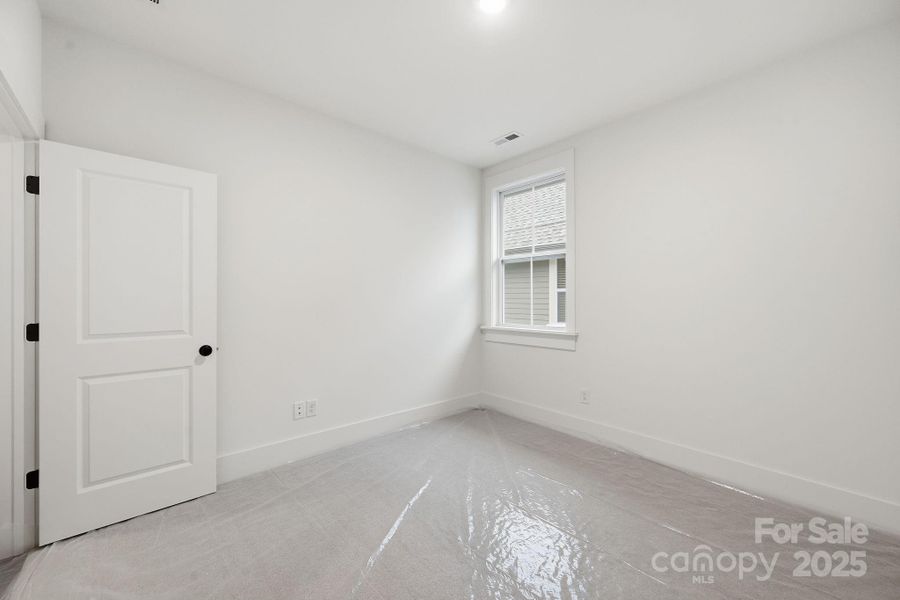 Bedroom #3 features a walk-in closet. Bedroom #3 features a walk-in closet.