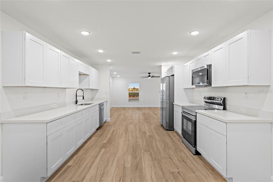 Furnished interior view inside a new home in , Okeechobee (Image 11).