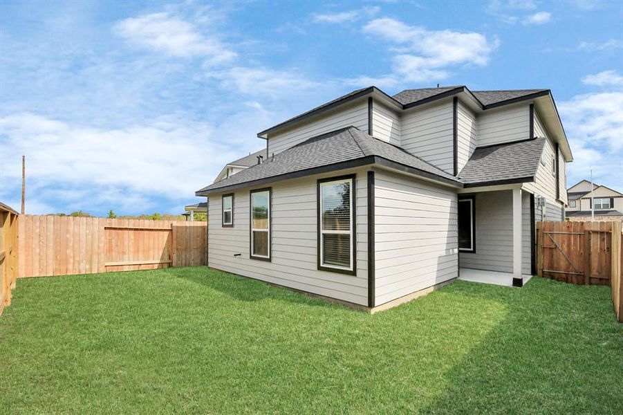 Backyard retreat, offering an abundance of space for kids to play and explore. The possibilities are endless in this outdoor haven, where the joy of open-air activities and family gatherings awaits.