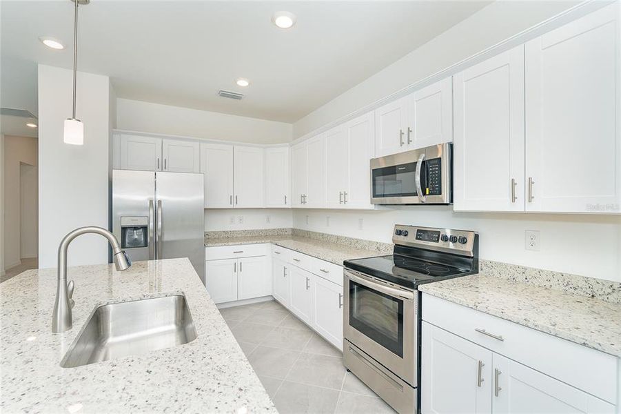 Furnished interior view inside a new home in , Port Charlotte (Image 10).