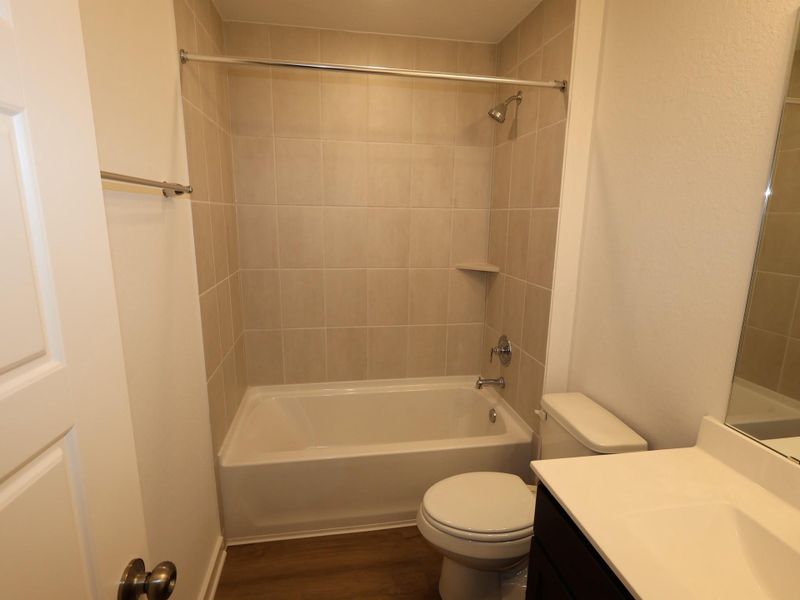 Furnished interior view inside a new home in Pinewood at Grand Texas, New Caney (Image 4).