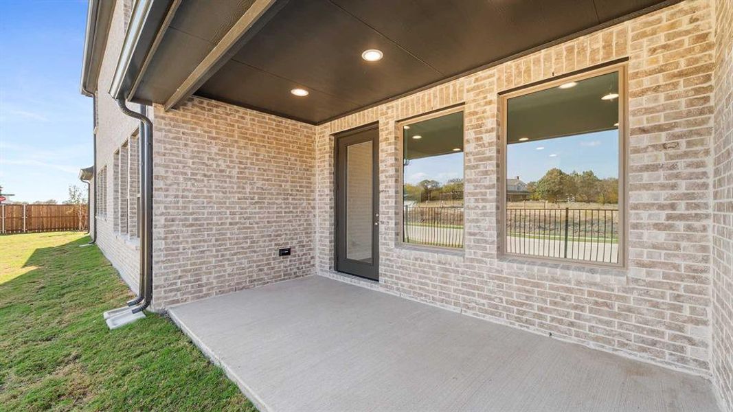 Exterior details and patio area of a home in The Heights At Uptown Celina 45', Celina (Image 3).