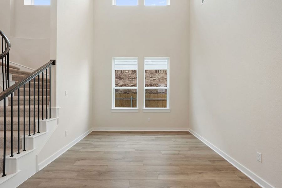 Spacious, unfurnished interior of a new home in Heritage, Dripping Springs (Image 22).