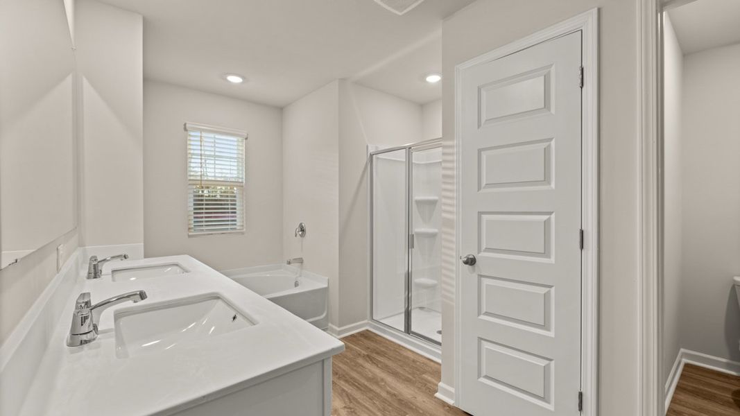 Representative furnished interior of a home built from the Hayden by D.R. Horton in Brooks Station, Dacula (Image 10).