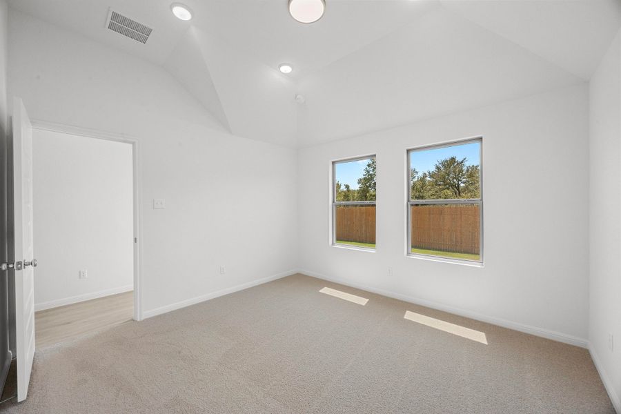 Primary Suite in the Cypress home plan by Trophy Signature Homes - REPRESENTATIVE PHOTO