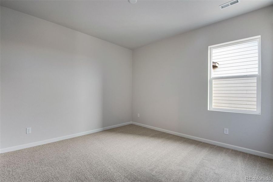 Spacious, unfurnished interior of a new home in Medley at Reunion Ridge, Commerce City (Image 36).