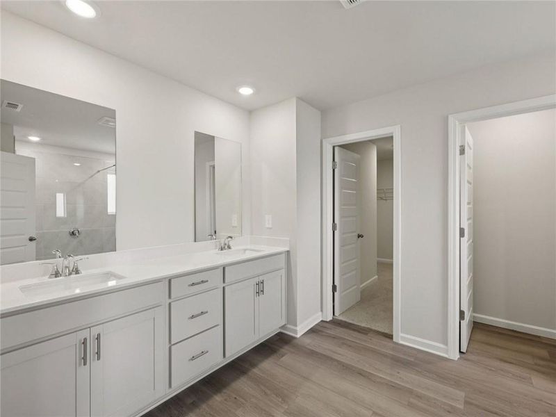 Furnished interior view inside a new home in Martin Springs - Estate Series, Lawrenceville (Image 10).