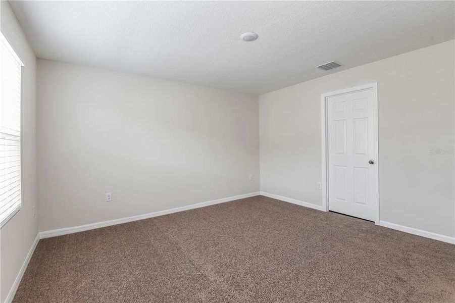Spacious, unfurnished interior of a new home in Grove at Crosswind, Haines City (Image 12). Spacious, unfurnished interior of a new home in Grove at Crosswind, Haines City (Image 12).