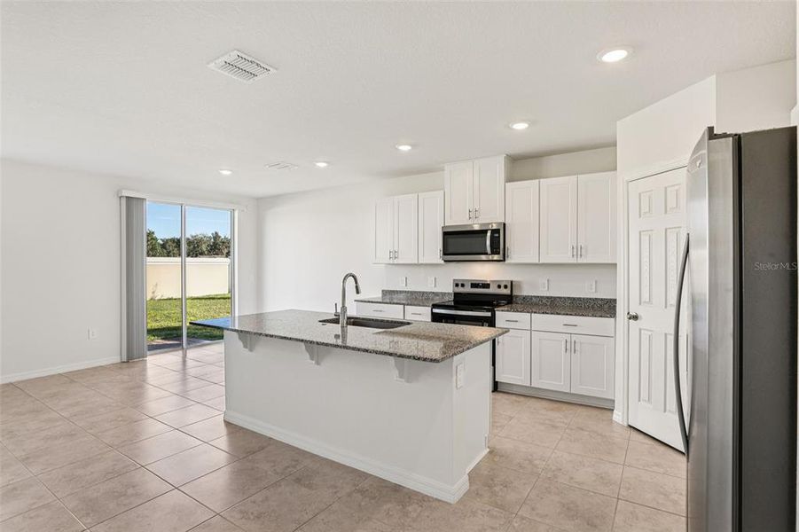 Furnished interior view inside a new home in Lawson Dunes - Signature Series, Haines City (Image 11). Furnished interior view inside a new home in Lawson Dunes - Signature Series, Haines City (Image 11).