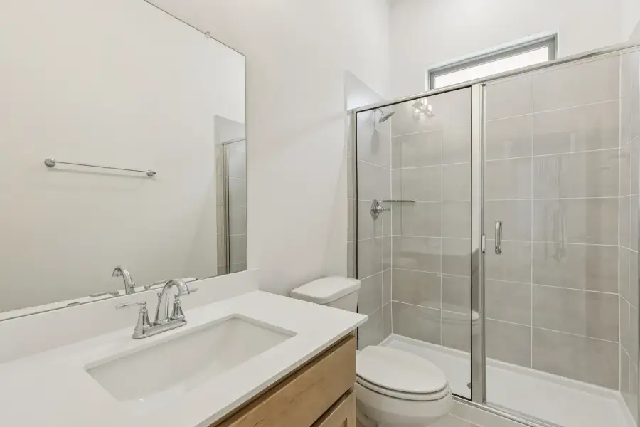 Bathroom in the Da Vinci II home plan by Trophy Signature Homes – REPRESENTATIVE PHOTO